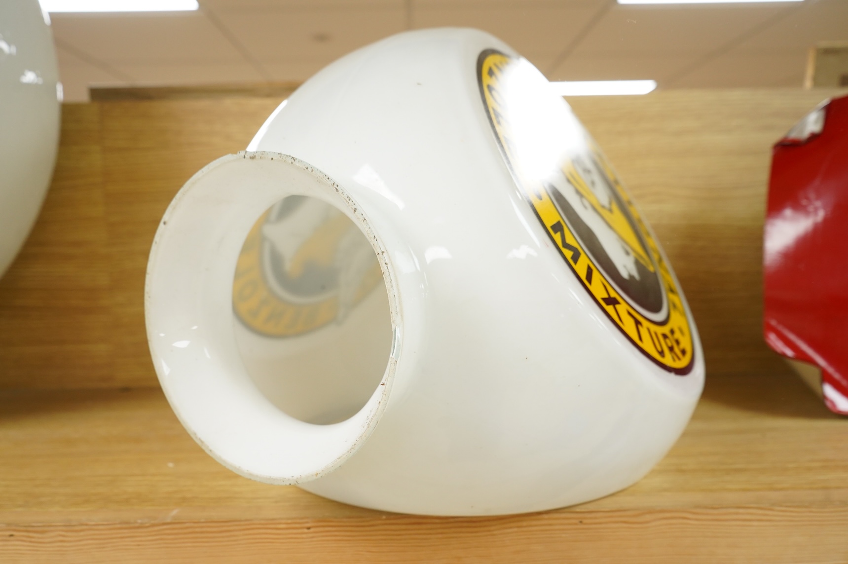 A National Benzole Mixture triple sided opaque glass petrol pump globe, 43cm high, (base af)